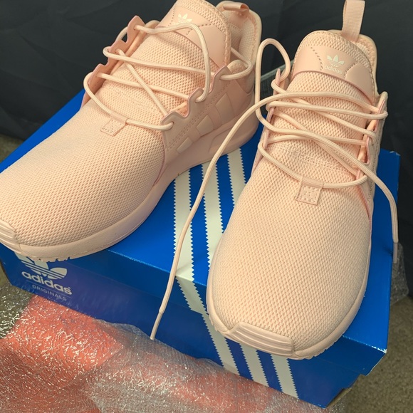 light pink adidas running shoes